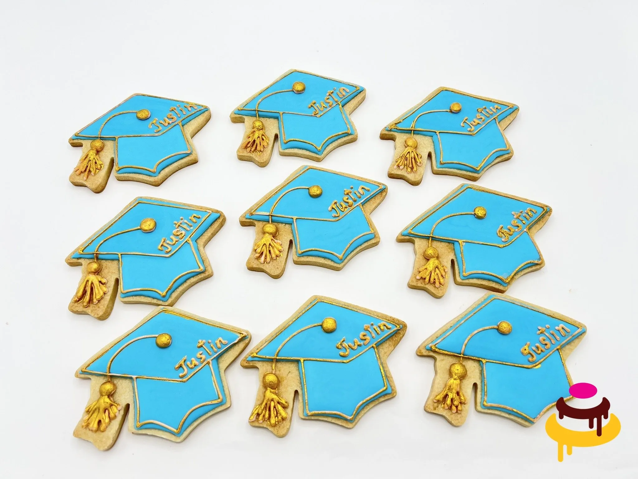 Custom hand-piped graduation cap cookies Bay Area bakery